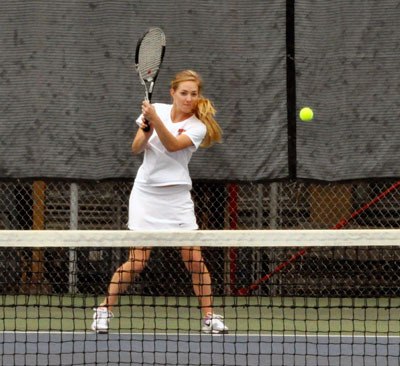 Marysville-Pilchuck’s Savannah Pearce competes in the Wesco 3A North girls tennis tournament at Stanwood High School on Wednesday