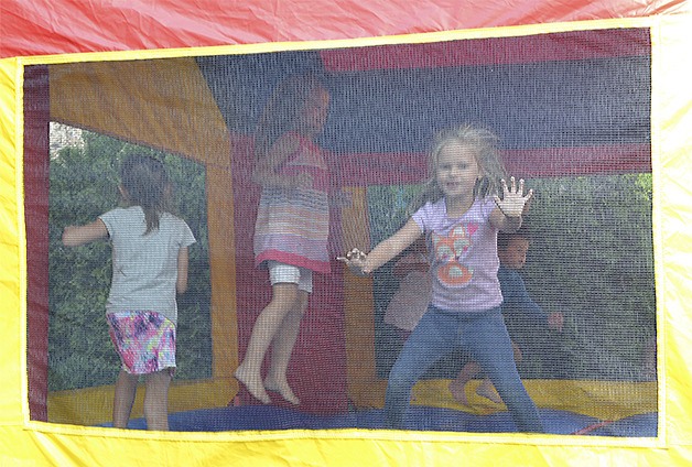 Kids enjoyed playing in the bouncy houses at the Marysville YMCA's 20th anniversary celebration Aug. 24.