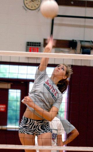 Senior Hayley Liebel spikes a ball during practice Aug. 26.