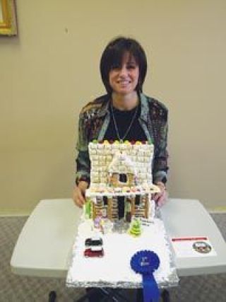 Third Street merchants announce winning gingerbread cabin