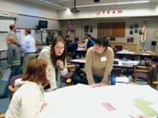 Toni Otto and Marysville School Board director Cindy Erickson consider attendance scenarios for elementary schools at a Jan. 11 meeting. I think we are moving forward and thats all who you can ask