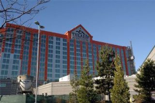 Construction equipment still somewhat dominates the view of the new Tulalip hotel. Notice the siding workers are installing up the sides of the building.
