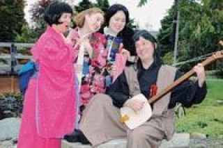 The cast of the Northwest Savoyards production of Gilbert and Sullivans The Mikado by includes tenor Scott Rittenhouse