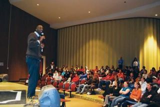 Business executive and motivational speaker Darmeny Jones addresses the School for the Entrepreneur at M-PHS Oct. 18. The average person doesnt stop to ask What is it that I do well? Jones said. All you have to do is have an idea; thats the essence of entrepreneurship.