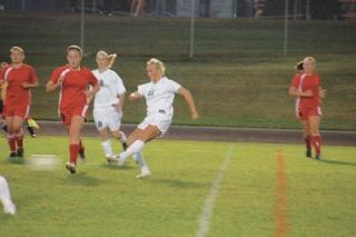 Hayley Bustad strikes a shot from 15 yards in front of the Coupeville net. This one didnt go in but Bustad finished with two scores on the night.