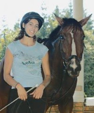 Jhesika Wells is all smiles standing along side GoGo