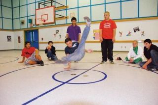 M-P junior Ben Nguyen demonstrates his agility during an open circle at the Allen Creek gymnasium Oct. 28.