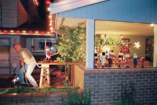 Marysvilles Dan Callaghan hams it up with his Christmas tree display: a tug of war over the tree between teams of nutcrackers