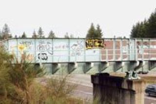 This railroad bridge over Interstate 5 is owned by the Tulalip Tribes but maintained by the state of Washington Department of Transportation. State patrol officials fear someone will get hurt while tagging the structure.