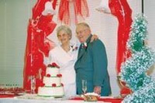 Marysville residents Esther Hartley and Merle Loucks celebrate their nuptials at a reception at the Grandview Village retirement home on Dec. 1.  He was married for 63 years and she was married for 56; and they recently got hitched with 119 years of marriage under their belts.