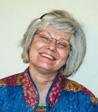 Kathy Firnstahl stops in at The Arlington Times excited about the news that she won an award in a contest at the National Gallery in London.