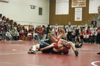 Mitch Johnson falls on Jacksons Ryan Feiock.