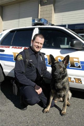 A love of dogs led Patrolman Derek Oates to become the latest member of the Marysville Police Departments K-9 unit. He is joined here by new partner