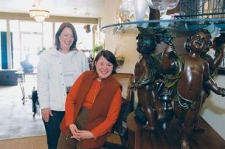 Gatherings owners posed next to some of the exotic wares available in their Third Street shop. From left are Jana Demaris and Carol Rochon. Its an interior store