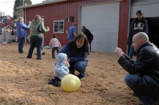 Cameras were as widespread as the plastic eggs kids hunted for in Jennings Park March 22. Dad Edward Williams snapped a shot of 1-year-old son James
