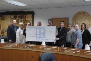 Realtors make donation to city