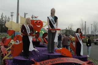 The recently selected Royalty Pageant winners test out their spots on the 2008 Strawberry Festival float. From left are Princess Che Renouard