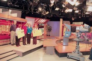 Members of the Navy Wives Clubs of America tape a public service announcement for Northwest Afternoon in the KOMO studios April 27.  From left are sponsor Mark Johnson of the Seattle Premium Outlet Mall
