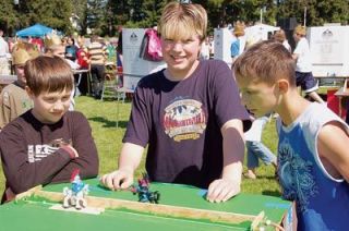 Seventh-grader Brendan Smith built a working joust tournament table for the Medieval Fair on May 24 at Marysville Middle School.  Students could make the two horsemen charge each other by quickly turning a pair of handles.  It was basically their entertainment