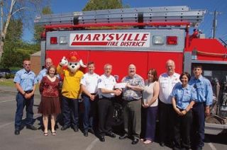 From left are Marysville firefighters Chan Crandall