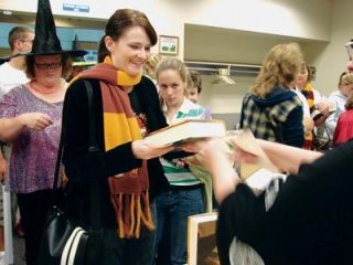 Jennifer Kiser was among the first fans in Marysville to secure a copy of the seventh and final book in the Harry Potter series at the Marysville Librarys Harry Potter party on July 20.