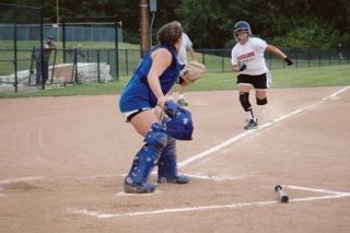 Shortstop Kahlee Barrio goes for the run in a third-inning attempt against Sedro-Woolley but was called out at the plate.