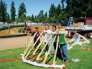 Pinewood Elementary School supporters help set up a new $13