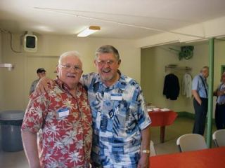 Adrian Tike Damish hams it up with Gene Robertson during the Marysville High School alum picnic on Aug. 23 at Jennings Memorial Park.  Three graduating classes from 1949 to 1951 gather once a year to share memories and recall the good times in the 58 years since they graduated from Marysville High School. Robertson