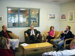 YMCA officials brief local politicians on the Health Communities Project during a Sept. 12 tour at the Marysville Y.  From left are U.S. Rep. Rick Larsen