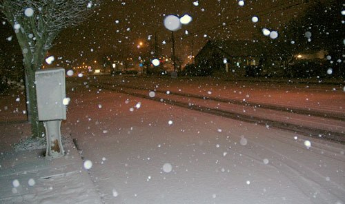 Snow covers Cedar Avenue in Marysville early Friday morning. The snowfall has caused the Marysville