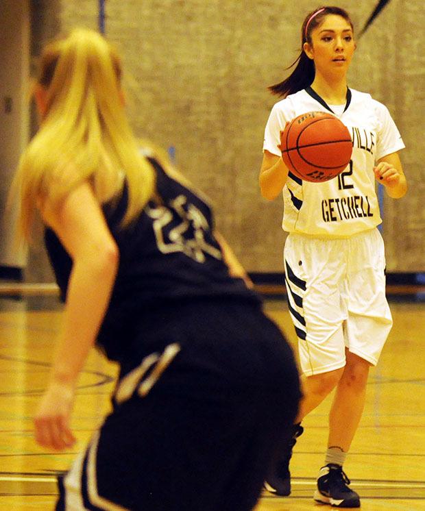 MG's Justice Vela dribbles the ball down the court against Granite Falls Dec. 6.