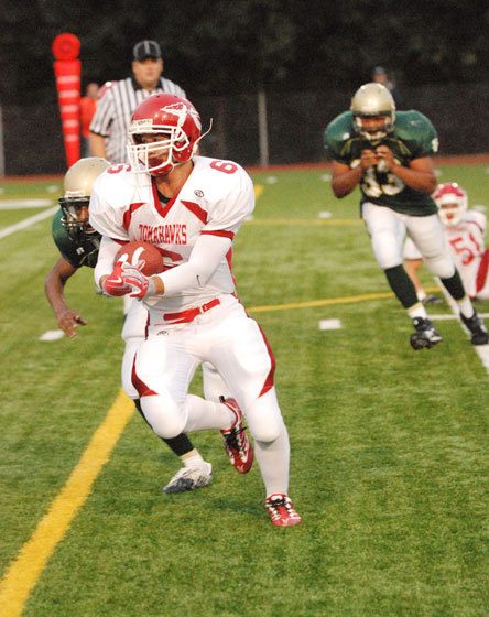 Senior running back Chris Larson looks for an open lane.