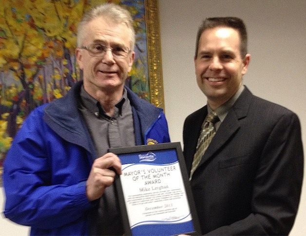 Mike Leighan is honored as December’s Volunteer of the Month by Marysville Mayor Jon Nehring on Jan. 27.