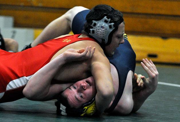 Senior Marcus Haughian pins opponent Jeff Bajema in the 189-pound to earn the individual title.