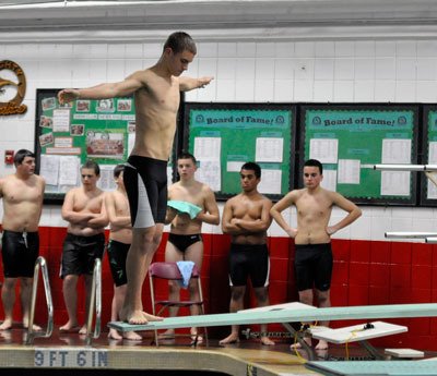 Sophomore diver Tyler Ducketh prepares to make his dive.