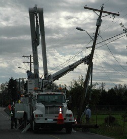 Snohomish County PUD and Frontier crews work on replacing a utility pole that was reportedly struck by a vehicle at approximately 10:30 a.m. Oct. 14.
