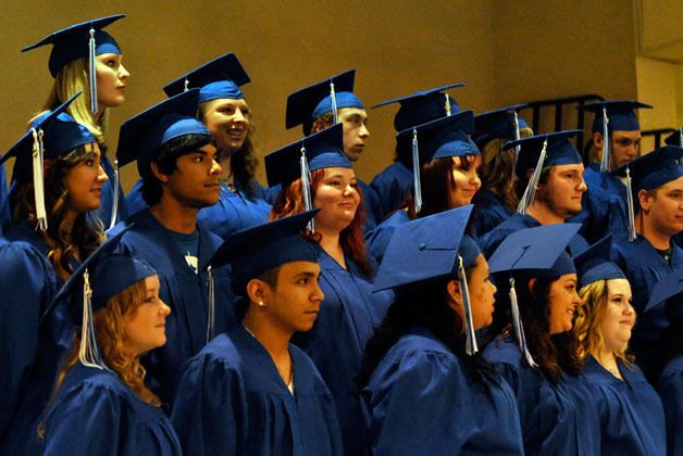 Mountain View High School graduates prepare to receive diplomas during the class of 2012 graduation and awards night ceremony at Cedarcrest Middle School on June 12.