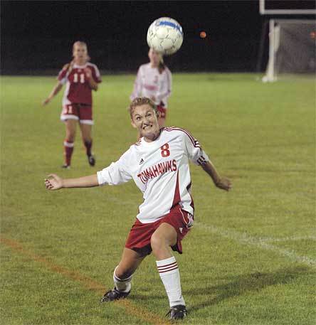 Sophomore midfielder Lauren Noltes keeps her eye on the ball.