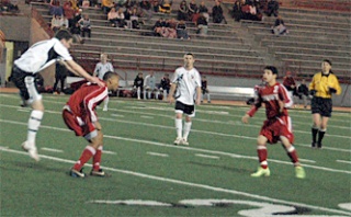 As Anival Moreno looks on