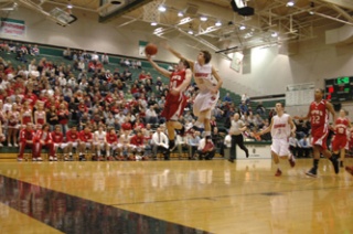 M-P senior Nick Soriano tries for some fast-break points in the first half