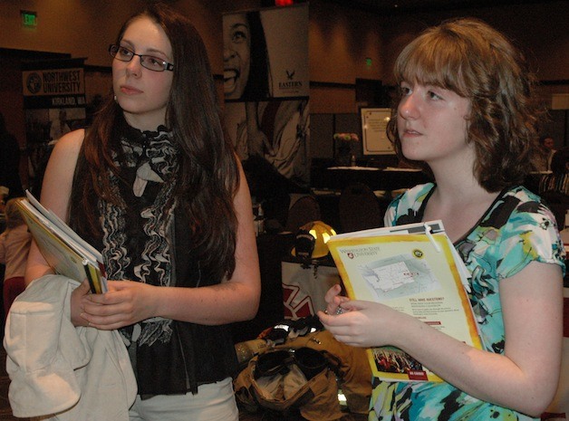 Emily Romeis of Lakewood and Sierra Reed of Lake Stevens discussed degree programs with representatives of George Fox University at last year's Opportunity Expo.