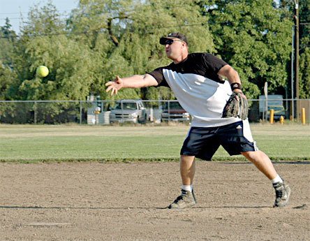Keith Sackett tosses a pitch for the Longhorns in their second 10-run win of the day. They defeated Uncle Rico’s All-Stars and the New Cal to advance to the championship game