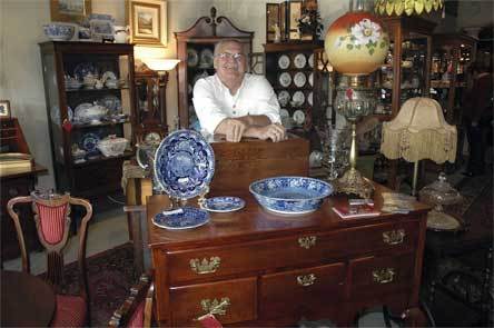 Some of Ron Martinez's pieces at Hidden Hill Antiques and Art are as old as his 1750s Colonial era desk.