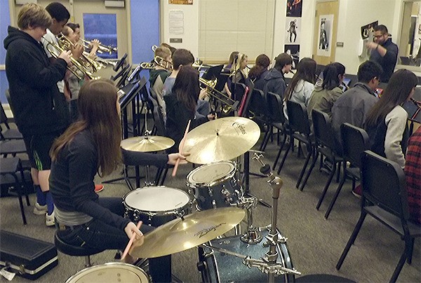 10th Street Jazz Band Director Nathan Sackman points to a musician to take a solo during practice before school Jan. 13. The band is one of six that will perform at a community event Jan. 30 at the Marysville Opera House.
