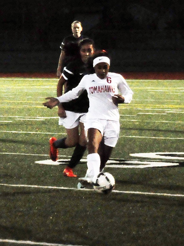 Olivia Lee of Marysville-Pilchuck controls the ball.