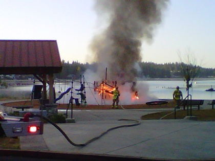 Marysville firefighters extinguish a playground fire at Lake Goodwin Community Park July 26.