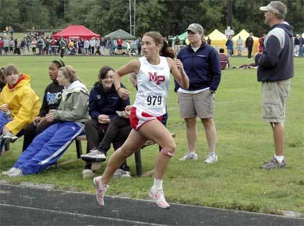 Junior Veronica Hall looks over her shoulder for competition at the finish line.