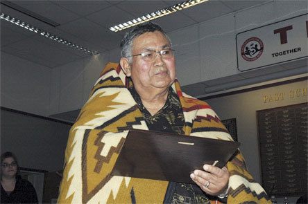 Retiring Marysville School District Board member Don Hatch Jr. receives a certificate of appreciation and a blanket from MSD Superintendent Dr. Larry Nyland and Assistant Superintendent Gail Miller Dec. 7.