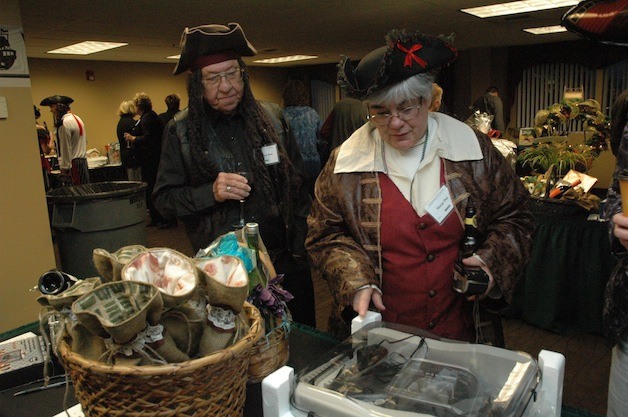 Clarence and Marge Due donned pirate-wear to check out an LP-to-digital music converter