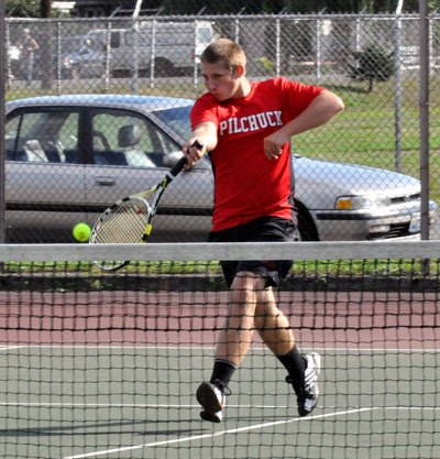 M-P’s Owin Ell competes against Lake Stevens’ No. 1 singles player during the Thursday
